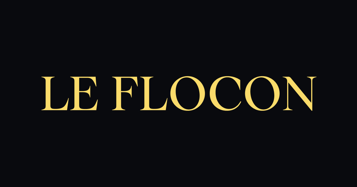 Goldenes Le Flocon Logo auf schwarzem Hintergrund als offizielles Social Sharing Bild der Luxus-Parfums The Angel und The Devil.