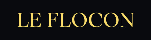 Goldenes Le Flocon Logo, elegantes Markenzeichen der Luxus-Parfums The Angel und The Devil.
